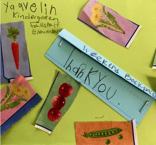 A child's drawing with cut out pictures of food and flowers and a note that says "Weekend Backpacks Thank You.